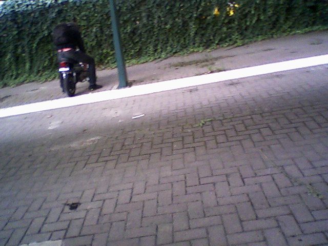 Louis F. sagging on moto