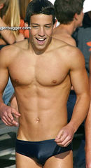 Hot guy + abs in black Speedo