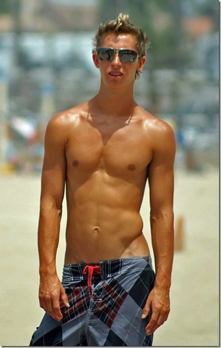 Fit guy in boardshorts