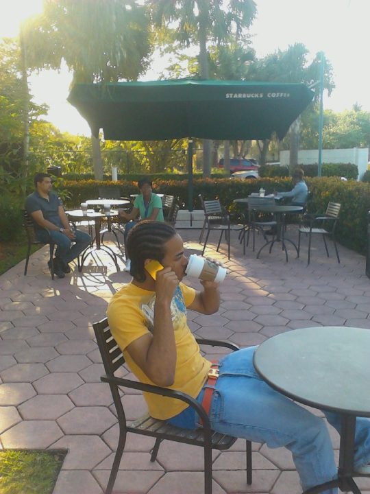 Sagging With A Hermes Orange Belt While Drinking Green Tea Outside Of Starbucks