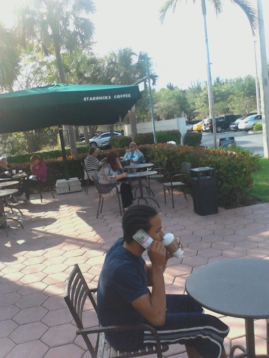 Sagging & Holding $250 In Hand Outside Of Starbucks While Drinking A Green Tea