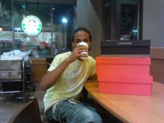 Drinking Vanilla Cappuccino Inside Of Starbucks