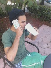 Sagging While Drinking A Vanilla Cappuccino and bands In My Hand Outside Of Starbucks