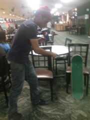Sagging With Pebble Green Skateboard While Drinking Pepsi Soda