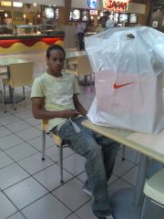 Sagging With Nike Bag Full Of Shoes In Sawgrass Food Court