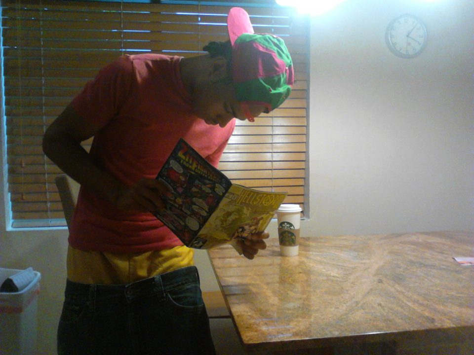 Reading Hell Storm Comic Book While Sagging In Yellow Gym Shorts