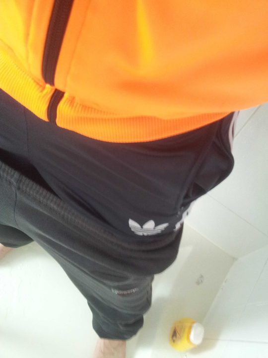 Sagging in wet Donnay sweatpants and Adidas firebird
