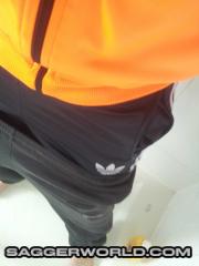 Sagging in wet Donnay sweatpants and Adidas firebird