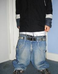 Look close at the belt see where the dude usually has it set 2 holes tighte