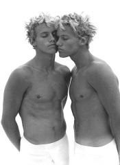 Twins Sharing a Kiss