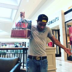 Leaving Vans Store with shopping bag!