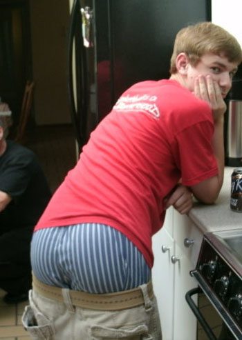 Sagger leaning over stove.jpg