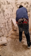 Flush the toilet with a bucket of water.